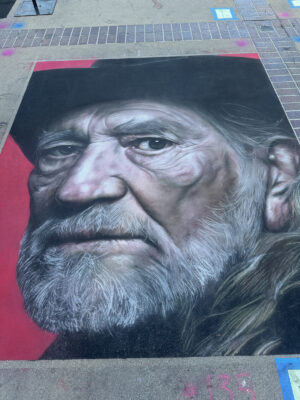 A gorgeous, photo-realistic chalk drawing of Willie Nelson by Shuji Nishimura.